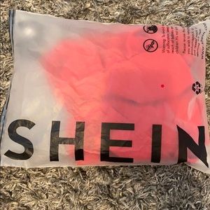 Red blouse from shein! It’s new never used.